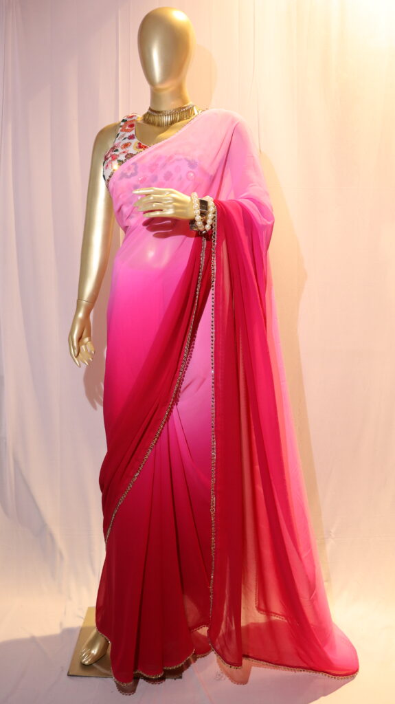 Mannequin wearing Pink saree with thread embroidery blouse design. Ombre saree with sleeveless blouse