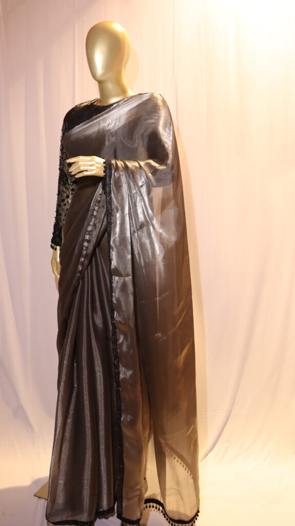 Mannequin Jimmy Choo Saree with designer black princess cut blouse with full sleeves.